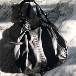 Rich black leather purse. Tons of space!